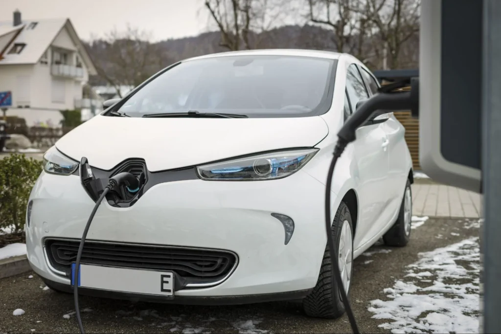 Electric car charging at home during off-peak hours at night for lower electricity cost